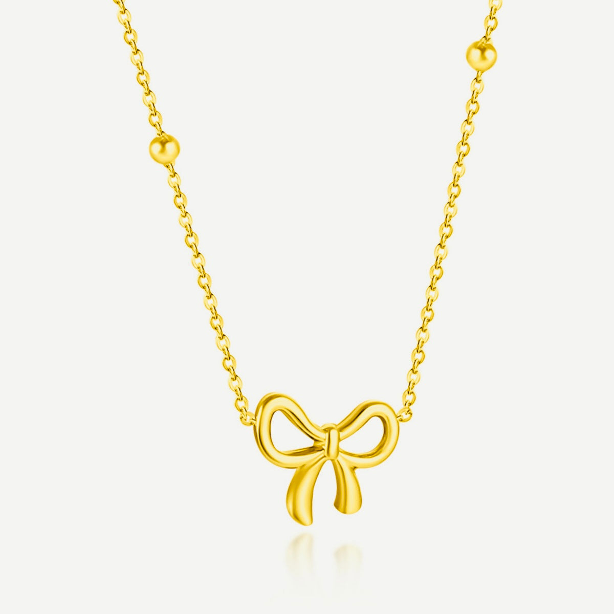 Collier noeud papillon plaqué Or 18 K
